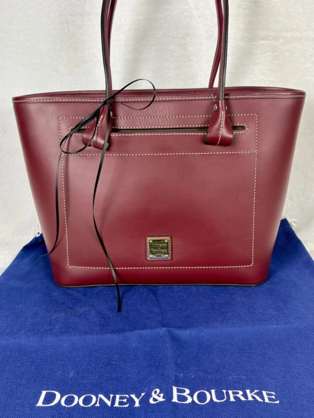 Dooney & Bourke Beacon Collection Slip Tote in Matte Bordeaux Vacchetta Leather